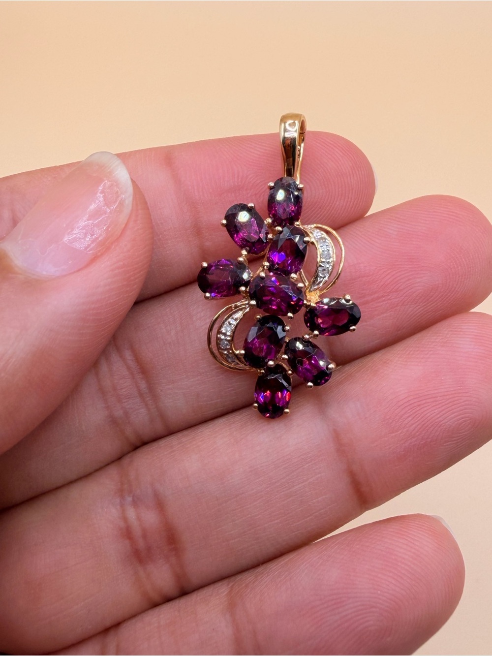 10k Yellow Gold 4 Ctw Rhodolite Garnet & Diamond Accent Enhanced Pendant.
